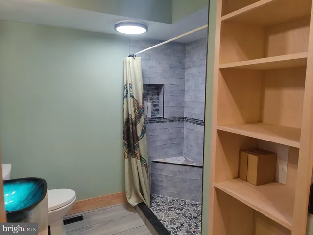 a bathroom with a sink and a toilet