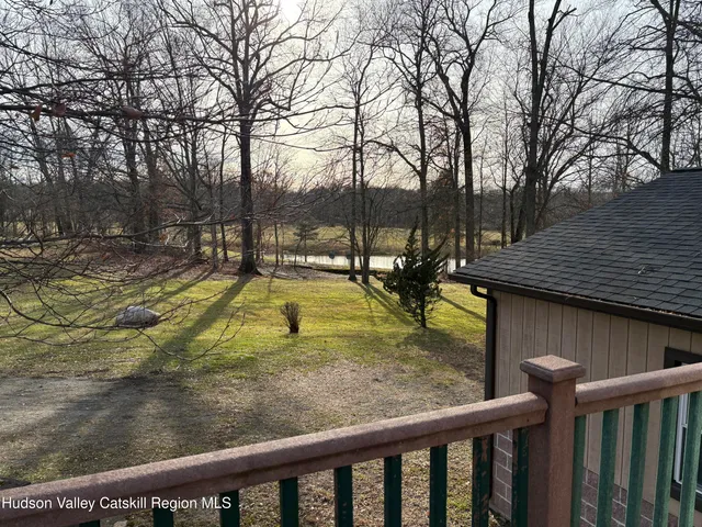 a view of swimming pool with sitting area