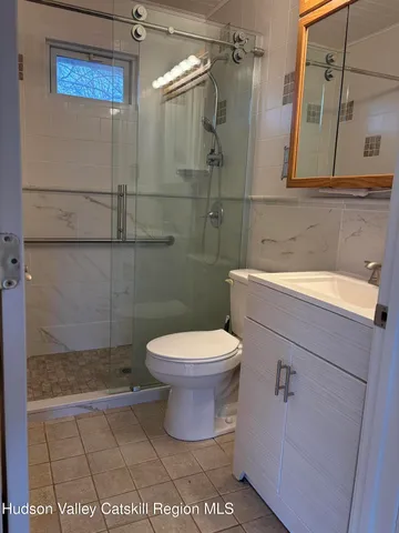 a bathroom with a toilet and a sink