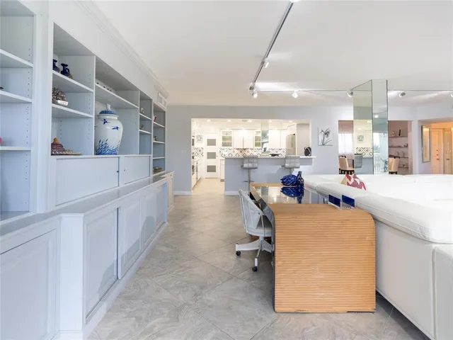 a view of a kitchen and dining room