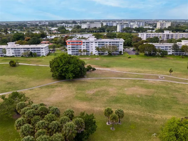 a view of a city with lawn chairs