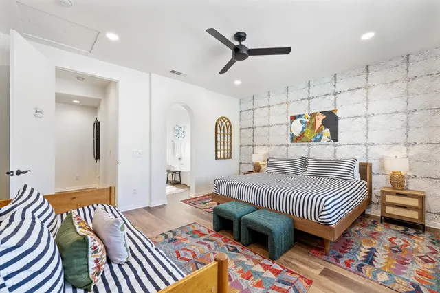 a bathroom with a shower and a sink