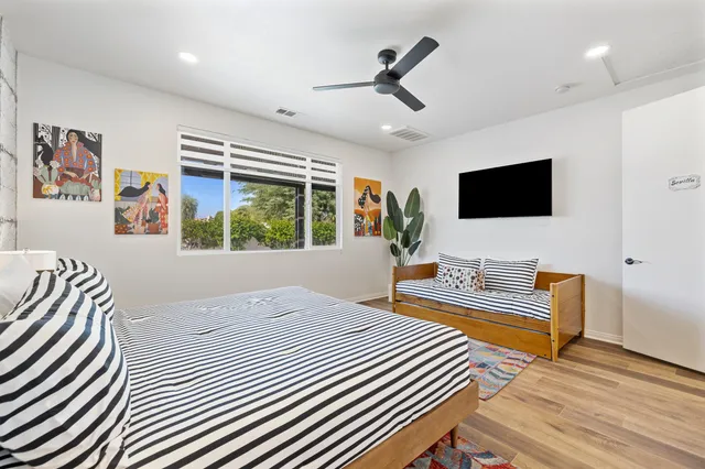 a bathroom with a sink a vanity and a mirror