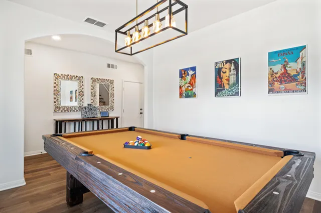 a kitchen with stainless steel appliances granite countertop a stove and a sink