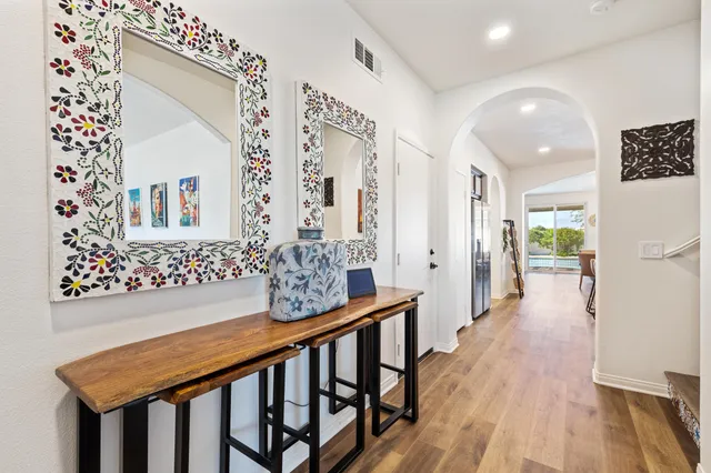 a kitchen with a table and chairs in it