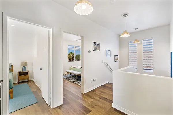 a view of living room with furniture and a window