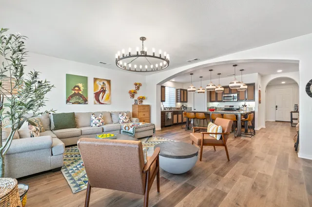 a view of a house with backyard porch and outdoor seating