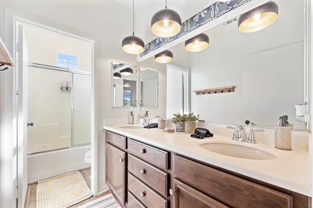 a bathroom with a shower and a toilet