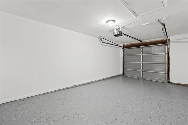 a view of room that has a ceiling fan