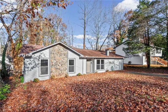 front view of a house with a yard
