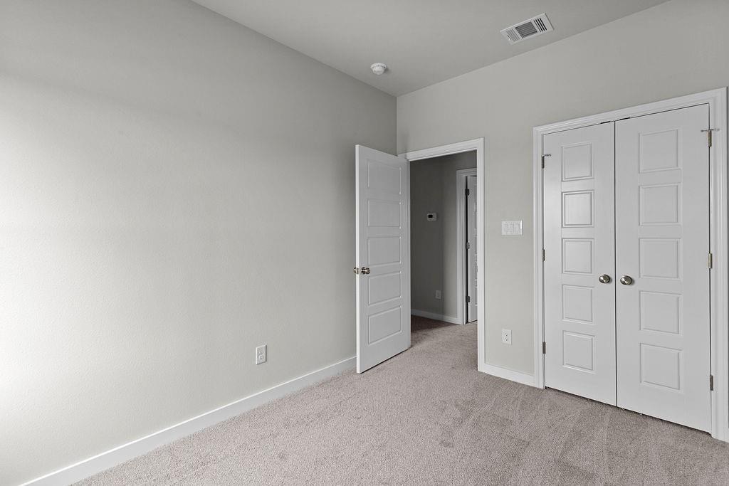 620 Alameda Road Azle, TX 76020 - Photo 24 of 27 a view of an empty room and closet area