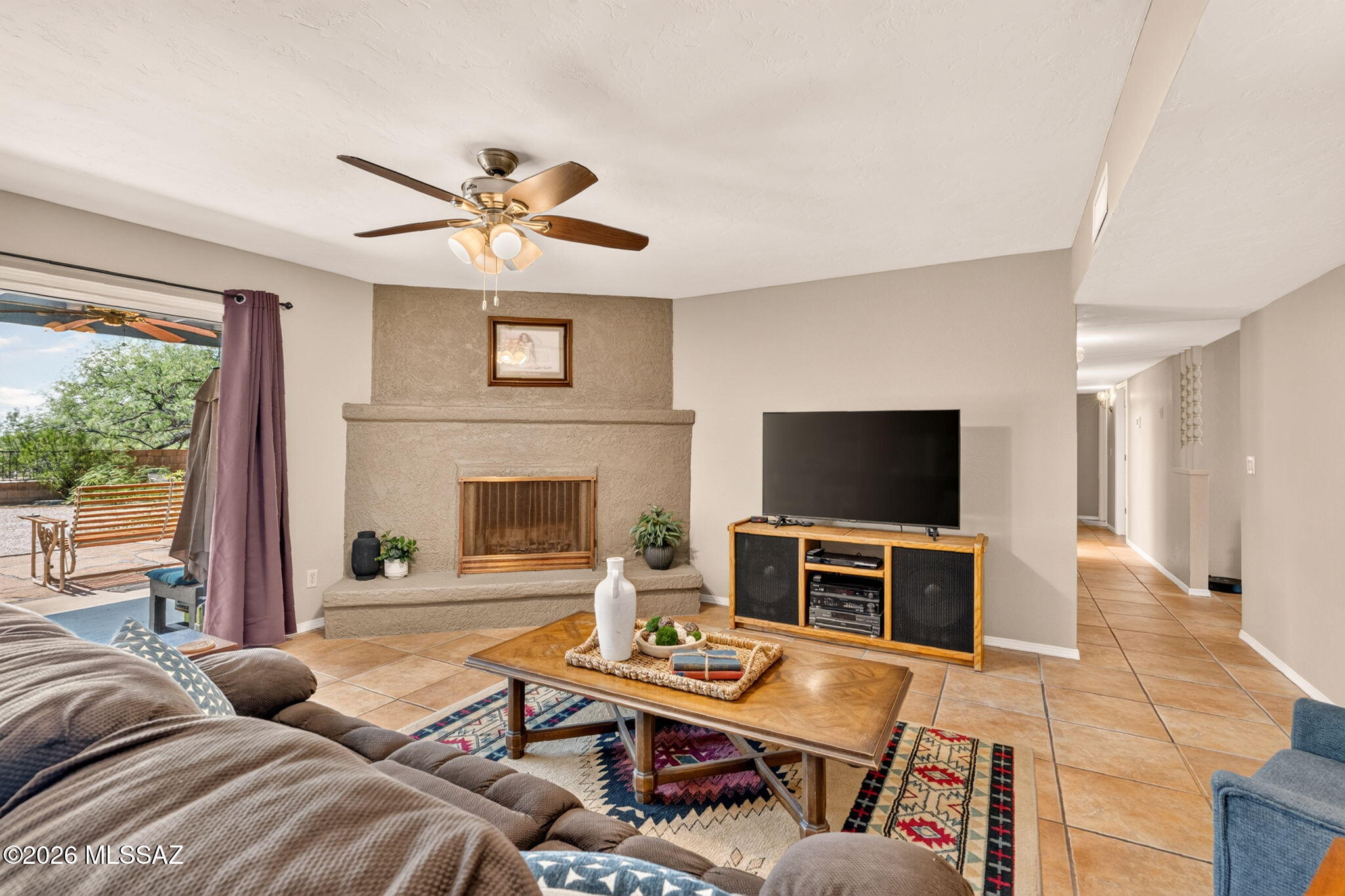 10800 East Snyder Road Tucson, AZ 85749 - Photo 15 of 51 Wood Burning or Gas Fireplace to cozy up your family room