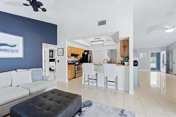 a living room with furniture and a table