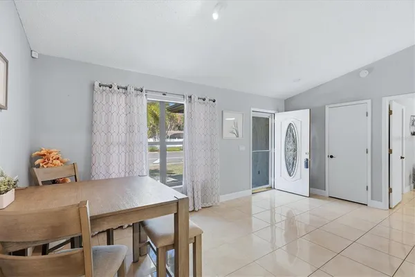 a view of a dining room with furniture