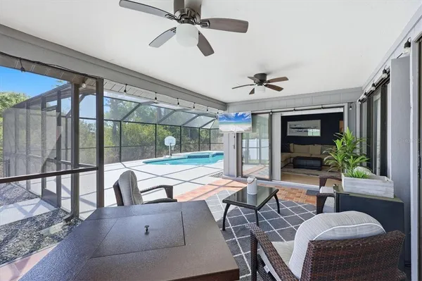 a outdoor space with lots of tables and chairs