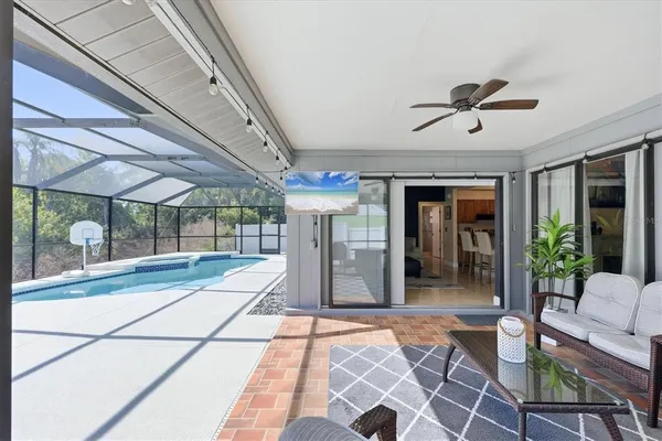 a view of a backyard with a swimming pool