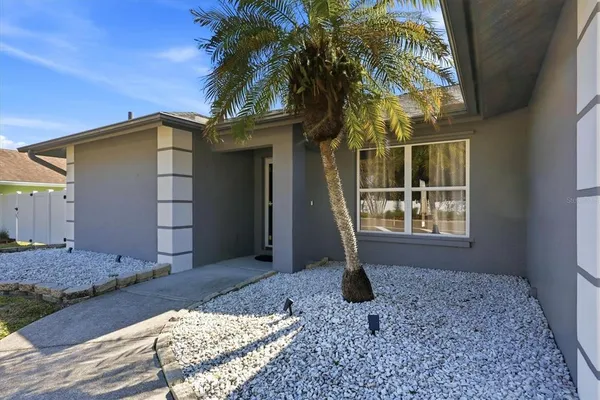 a house with trees in front of it