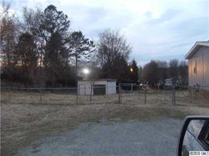 2257 Circle R Road Concord, NC 28025 - Photo 2 of 5 a view of a yard