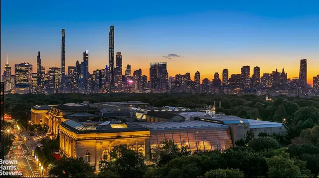 a view of a city with tall buildings