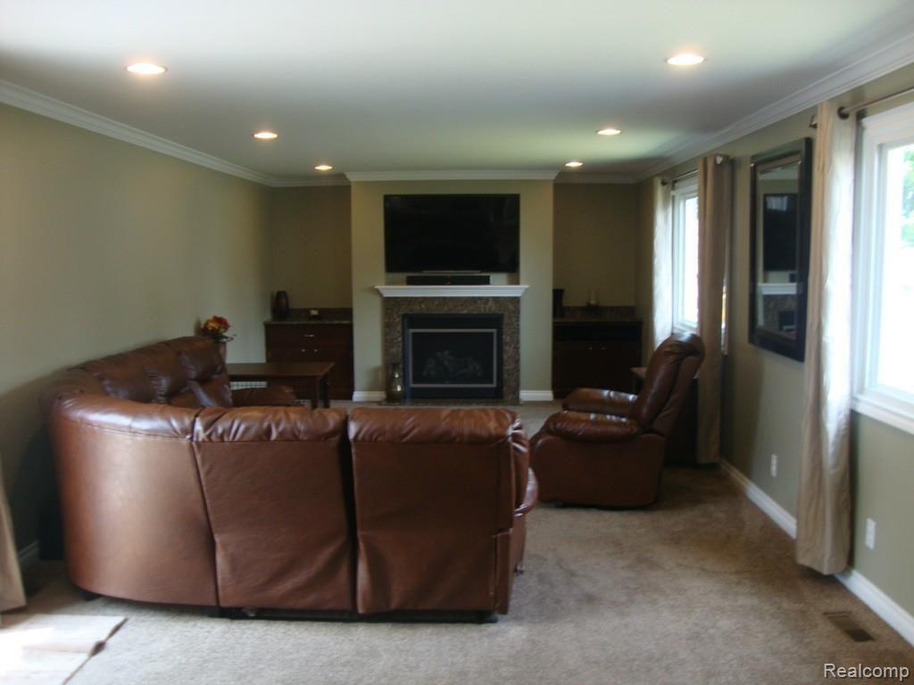 Large family room with granite fireplace