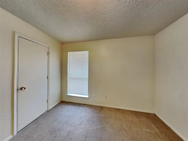 an empty room with closet