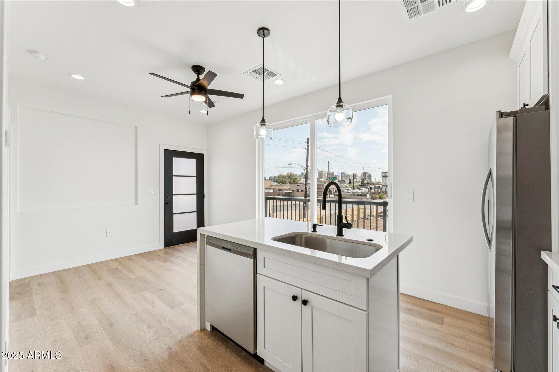 1508 West Sherman Street, Unit C Phoenix, AZ 85007 - Photo 14 of 15 03-003-living-kitchen