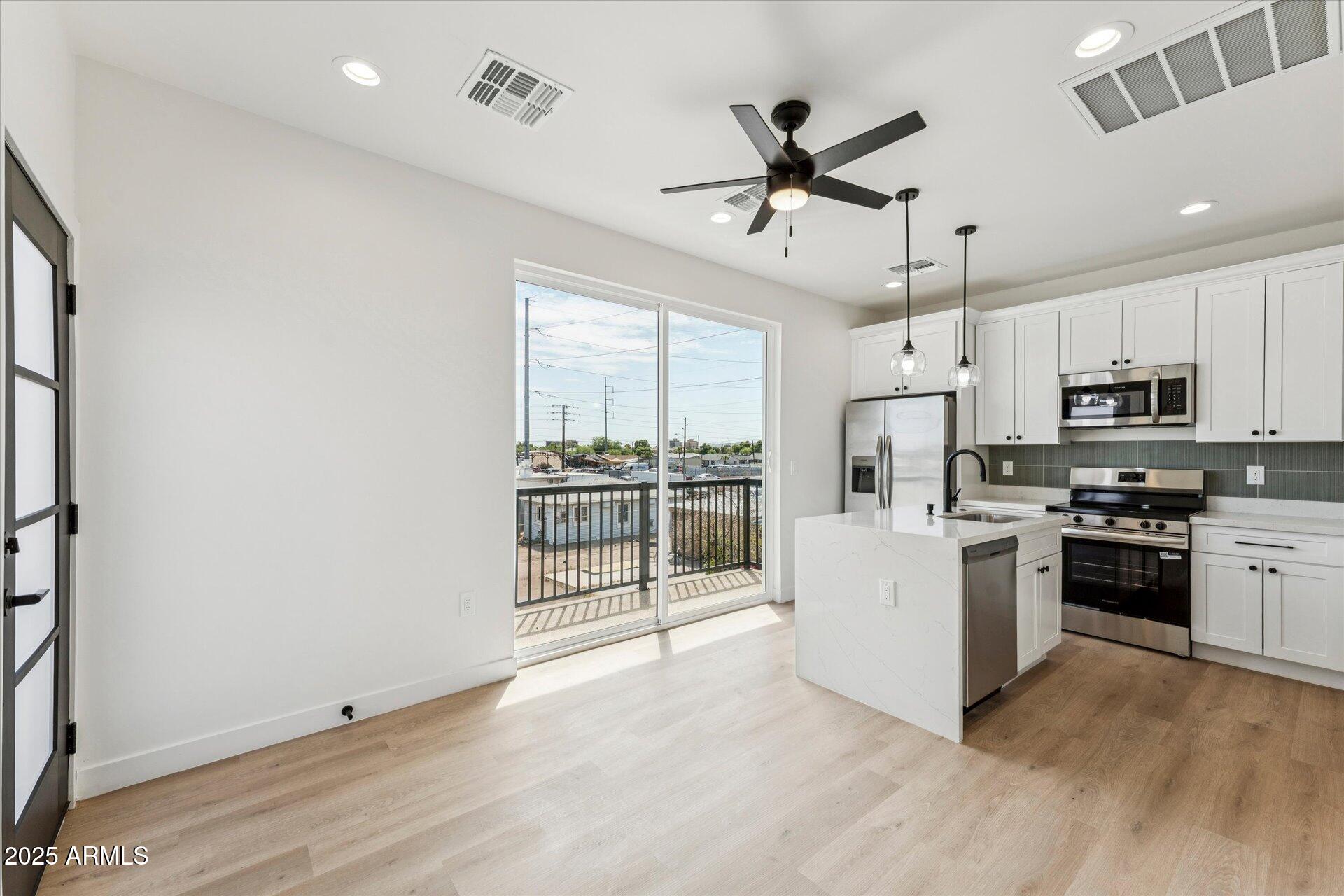 1508 West Sherman Street, Unit C Phoenix, AZ 85007 - Photo 15 of 15 02-002-living-kitchen