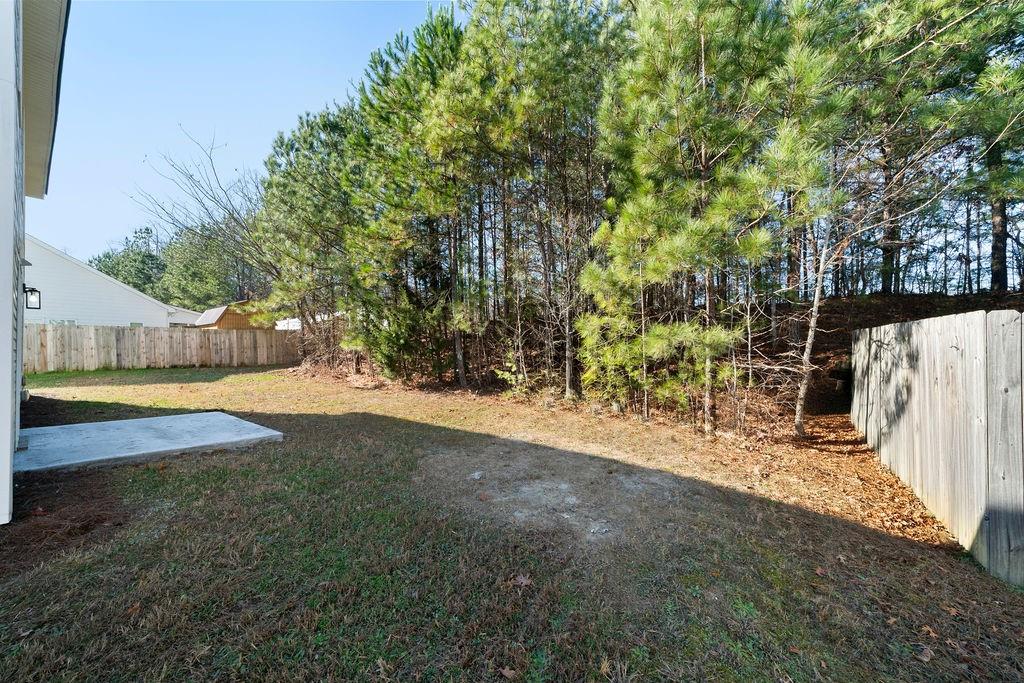 21 Walton Creek Drive Southwest Rome, GA 30165 - Photo 25 of 26 a view of a yard with large trees