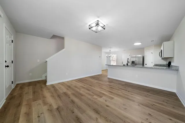 a view of kitchen and windows