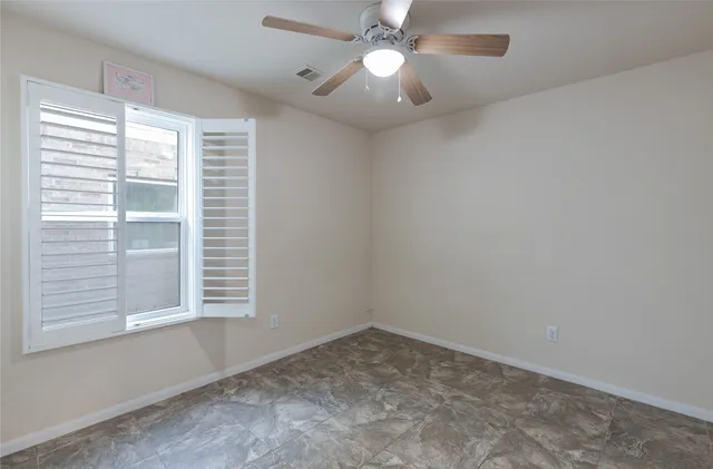 a view of a livingroom with furniture and a flat screen tv
