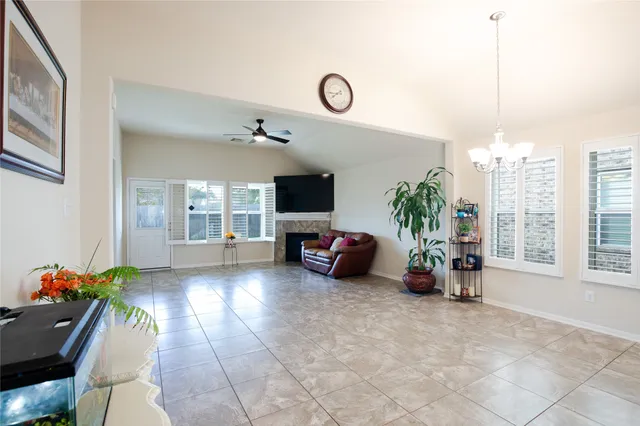 a view of a kitchen with furniture and a kitchen