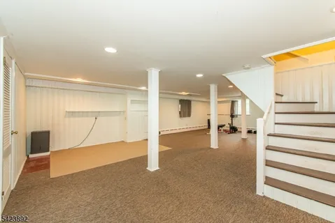 workspace with wooden floor and windows