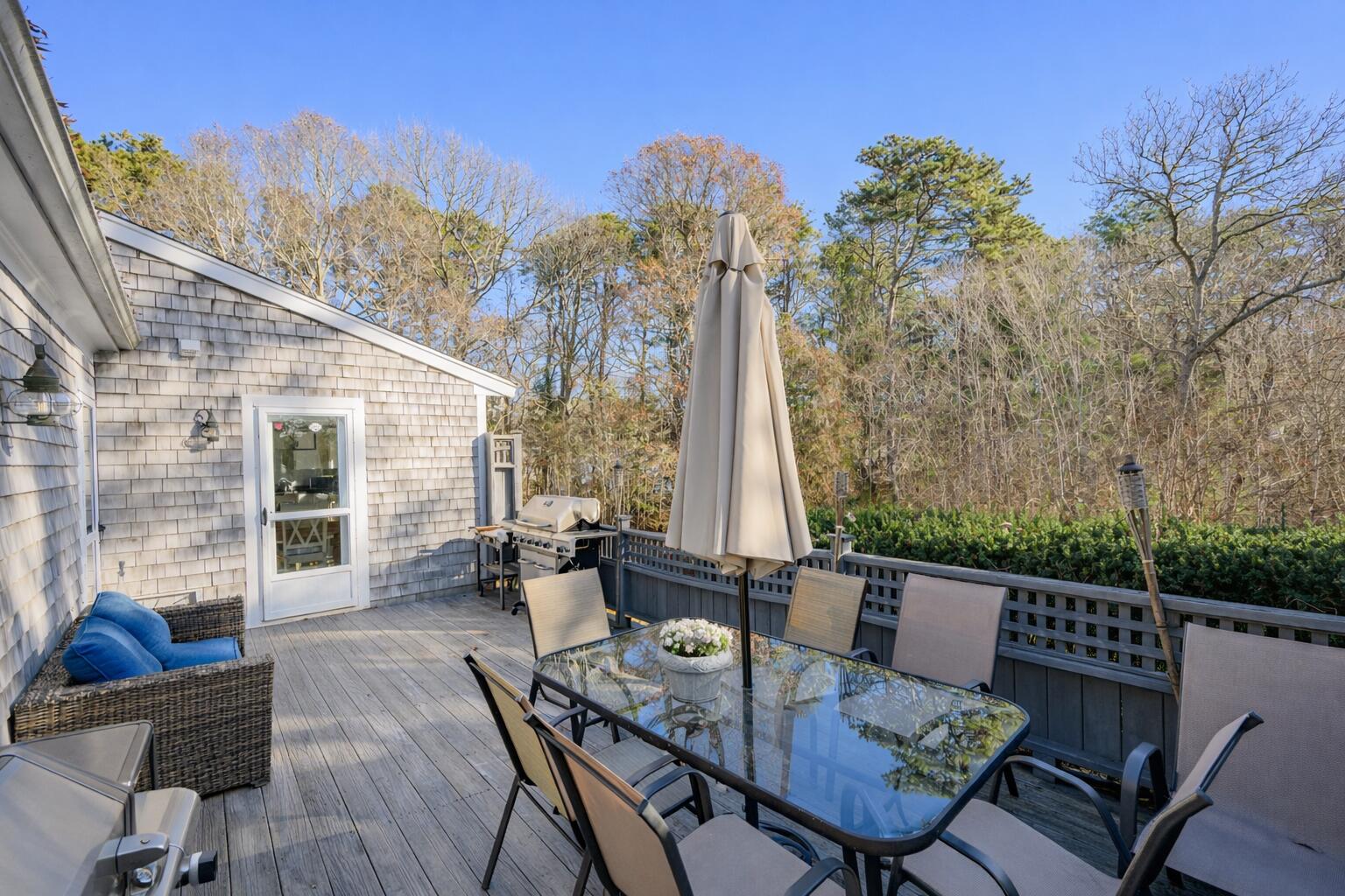 578 Huckins Neck Road Centerville, MA 02632 - Photo 34 of 51 Cape Cod deck with sunny views