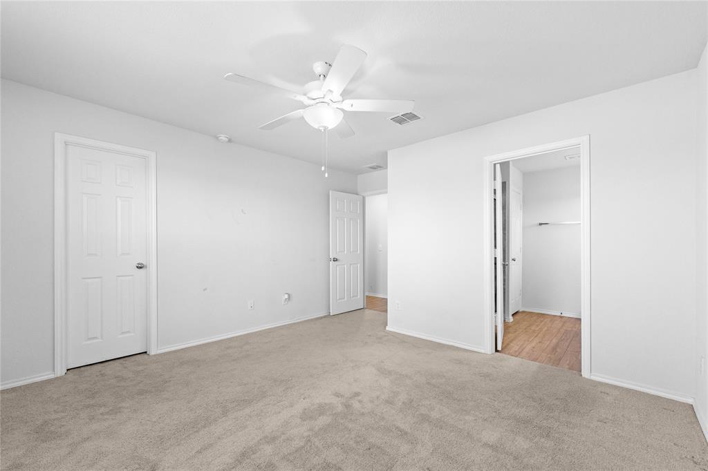 4432 Sagecroft Road Fort Worth, TX 76036 - Photo 7 of 16 Unfurnished bedroom featuring light colored carpet and a ceiling fan