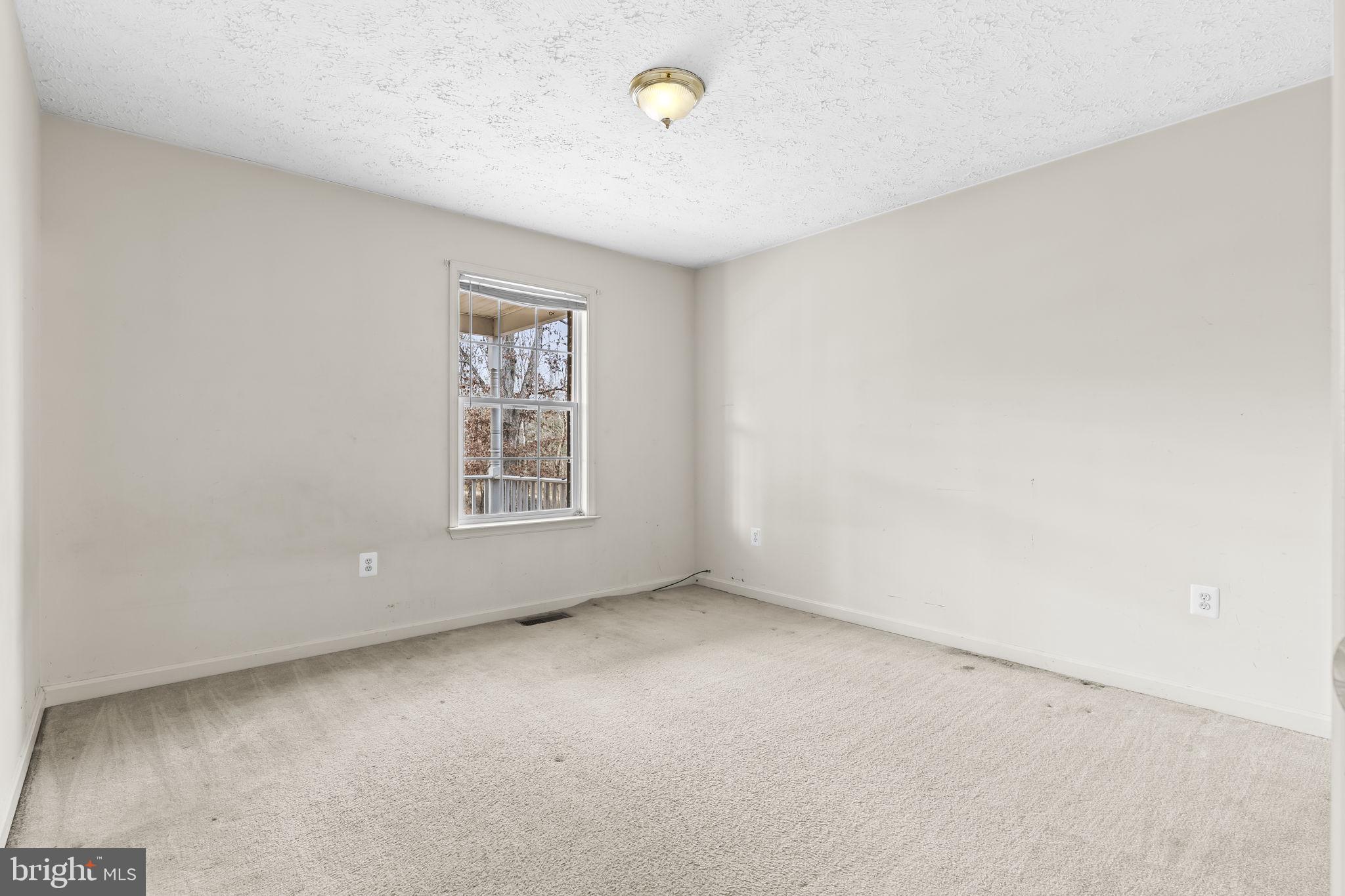 9400 Penns Hill Road La Plata, MD 20646 - Photo 15 of 39 an empty room with windows