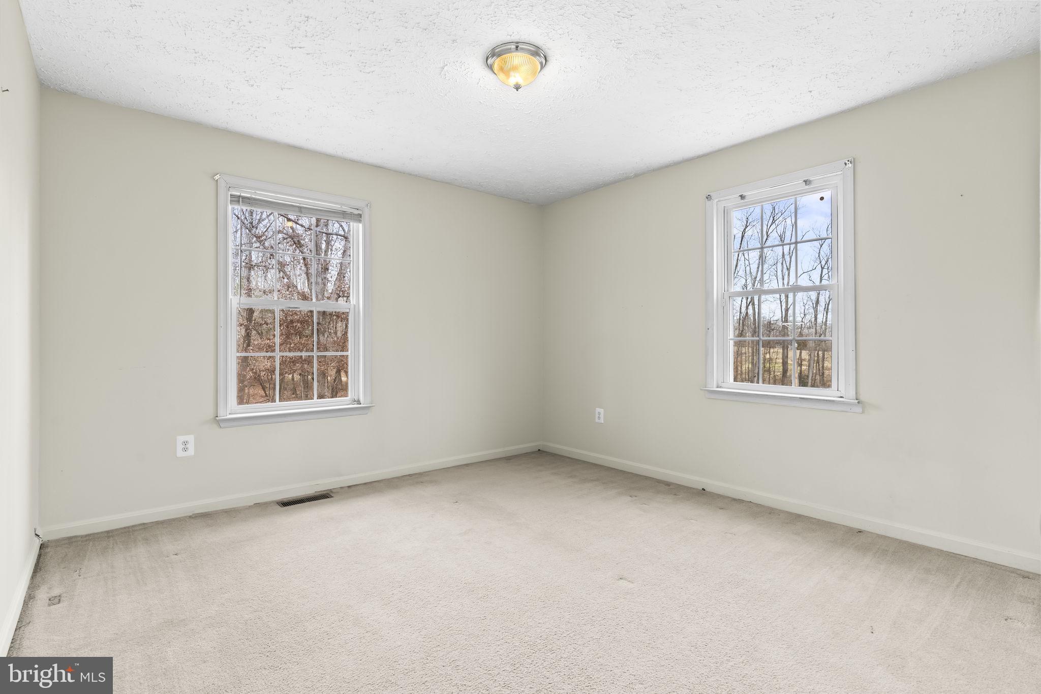 9400 Penns Hill Road La Plata, MD 20646 - Photo 18 of 39 a view of an empty room with a window