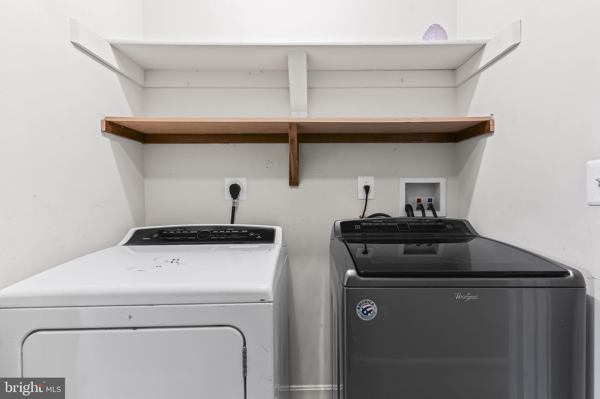 9400 Penns Hill Road La Plata, MD 20646 - Photo 25 of 39 a close up view of washer and dryer