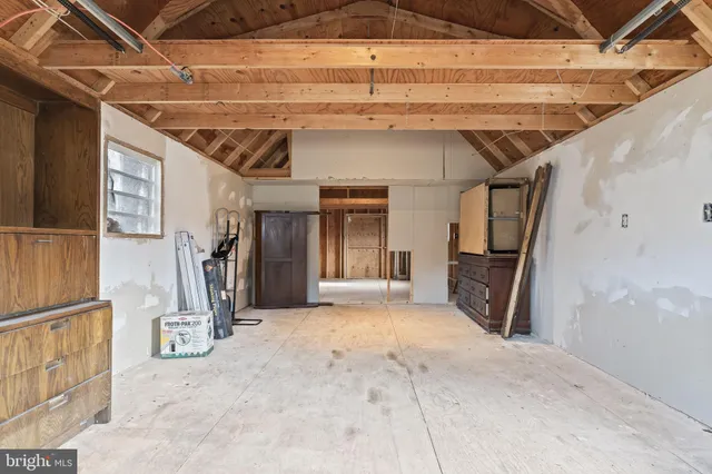 a view of an entryway with a door