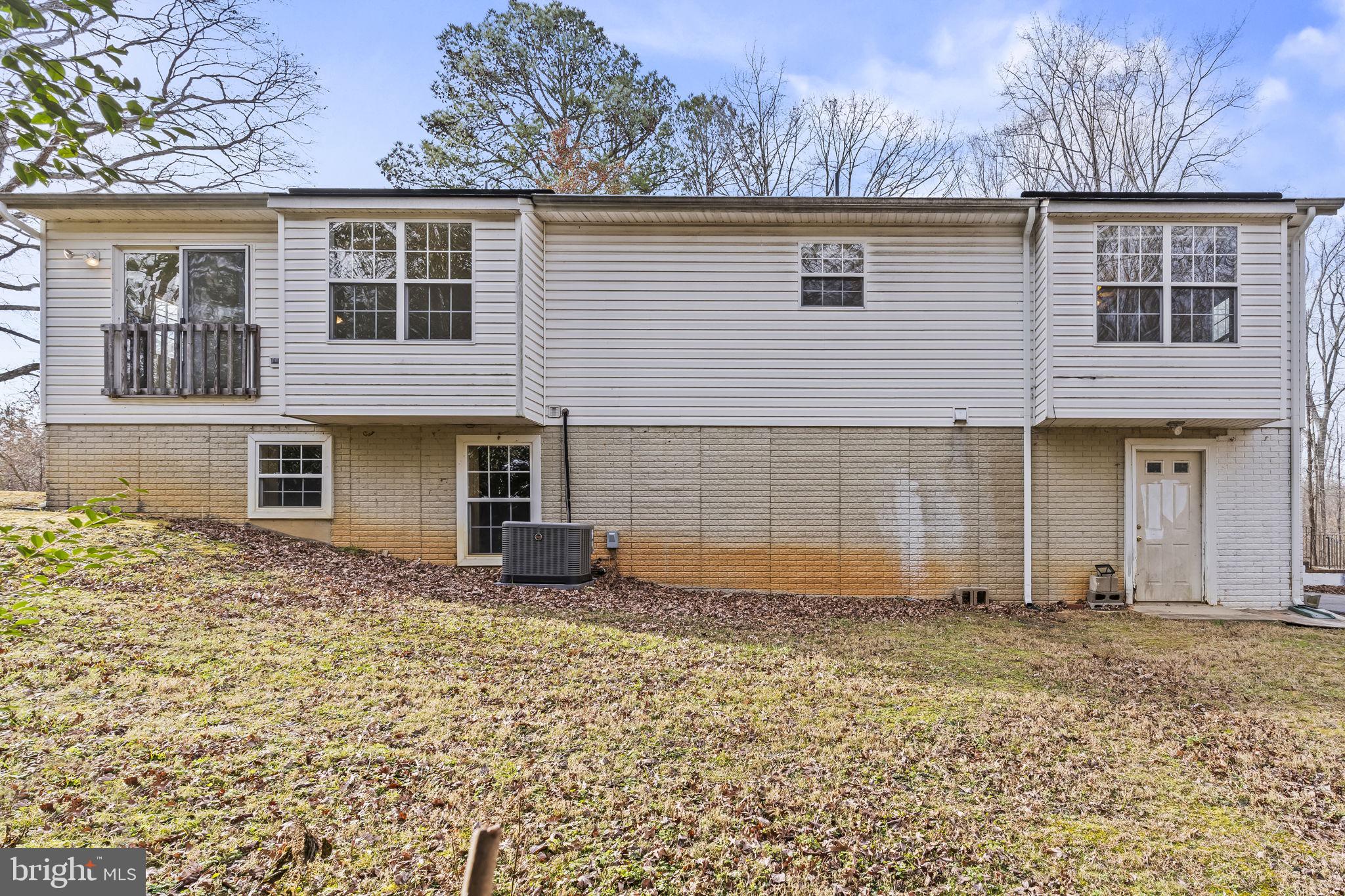 9400 Penns Hill Road La Plata, MD 20646 - Photo 35 of 39 a front view of a house with a yard