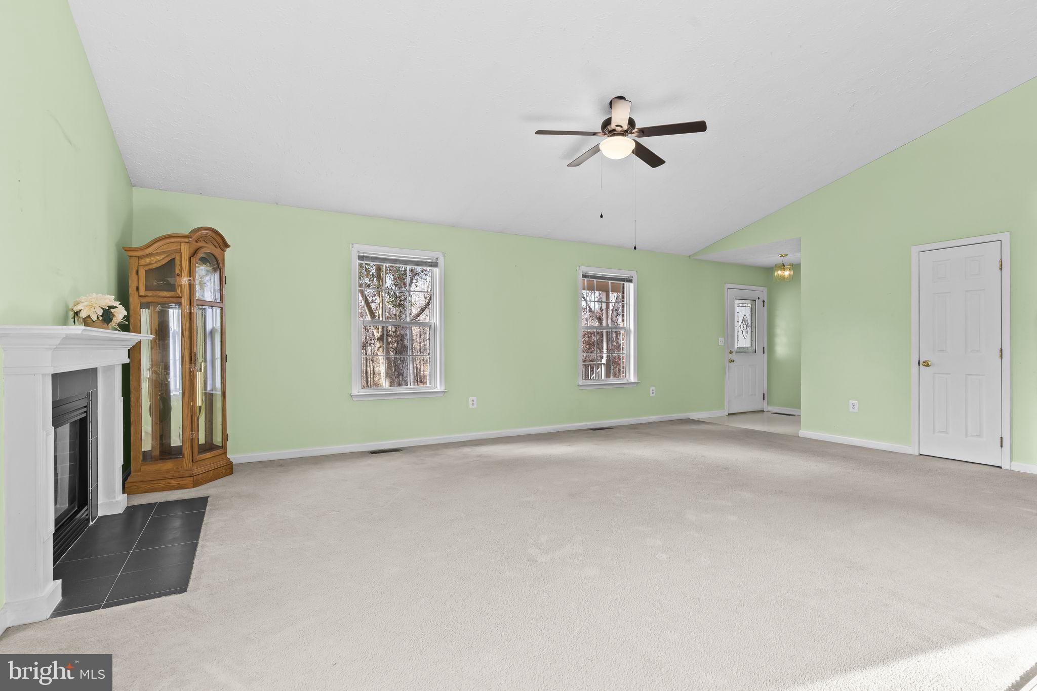 9400 Penns Hill Road La Plata, MD 20646 - Photo 7 of 39 a view of a livingroom with a ceiling fan and window