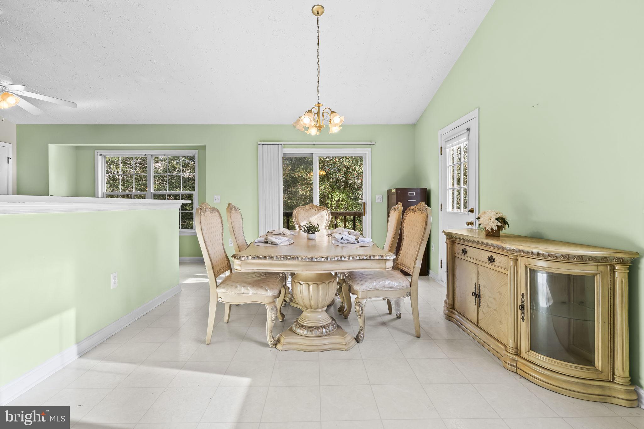9400 Penns Hill Road La Plata, MD 20646 - Photo 10 of 39 a view of a dining room with furniture window and outside view