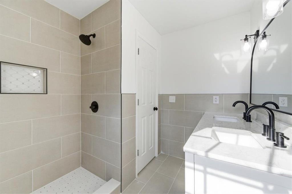 130 Malone Drive Rome, GA 30165 - Photo 20 of 45 a bathroom with a sink and shower