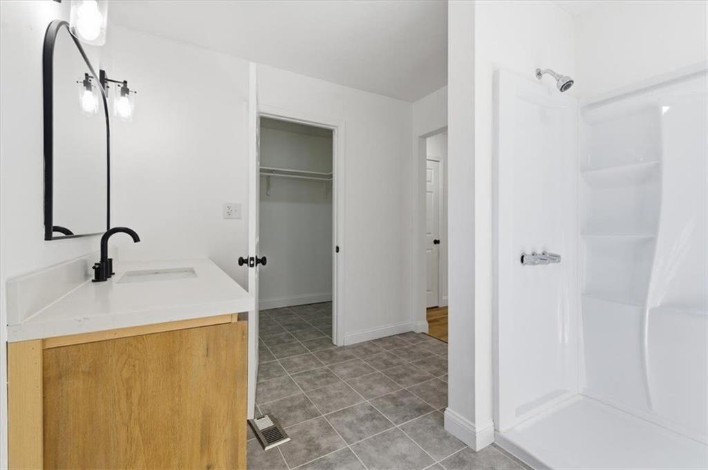 130 Malone Drive Rome, GA 30165 - Photo 24 of 45 a bathroom with a sink and a mirror