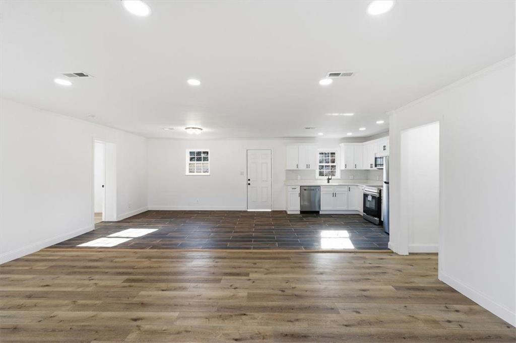 130 Malone Drive Rome, GA 30165 - Photo 3 of 45 a view of a kitchen with kitchen island a sink stainless steel appliances and cabinets