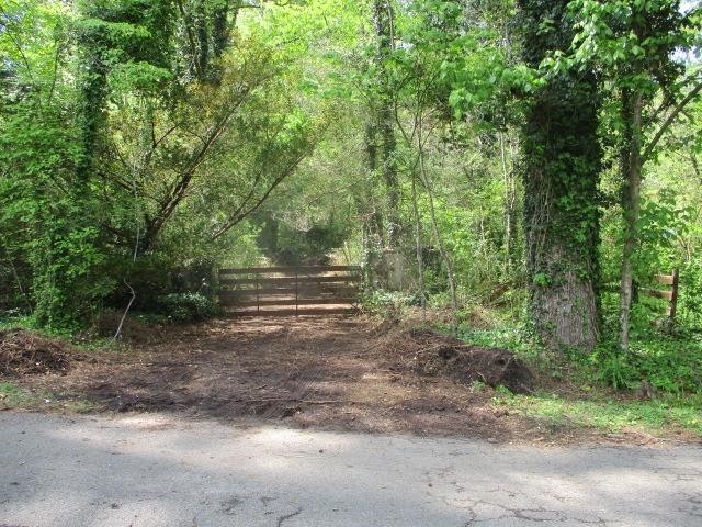 0 Honeycomb Road Grant, AL 35747 - Photo 8 of 8 a backyard of a house with lots of green space