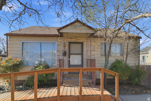 935 400 North Provo, UT 84601 - Photo 1 of 1 View of front facade with a deck and stone siding