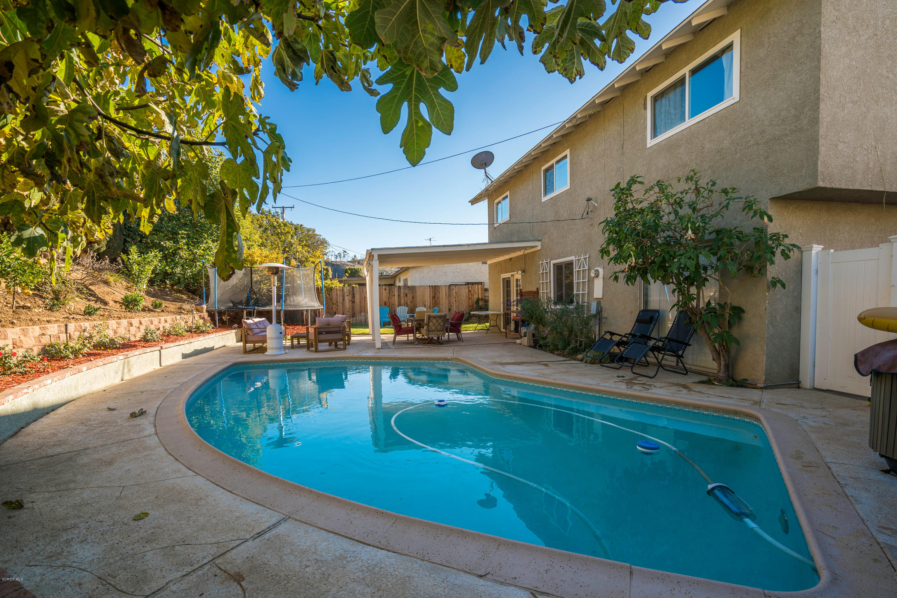 2849 Fitzgerald Road Simi Valley, CA 93065 - Photo 22 of 25 a view of a swimming pool with a patio