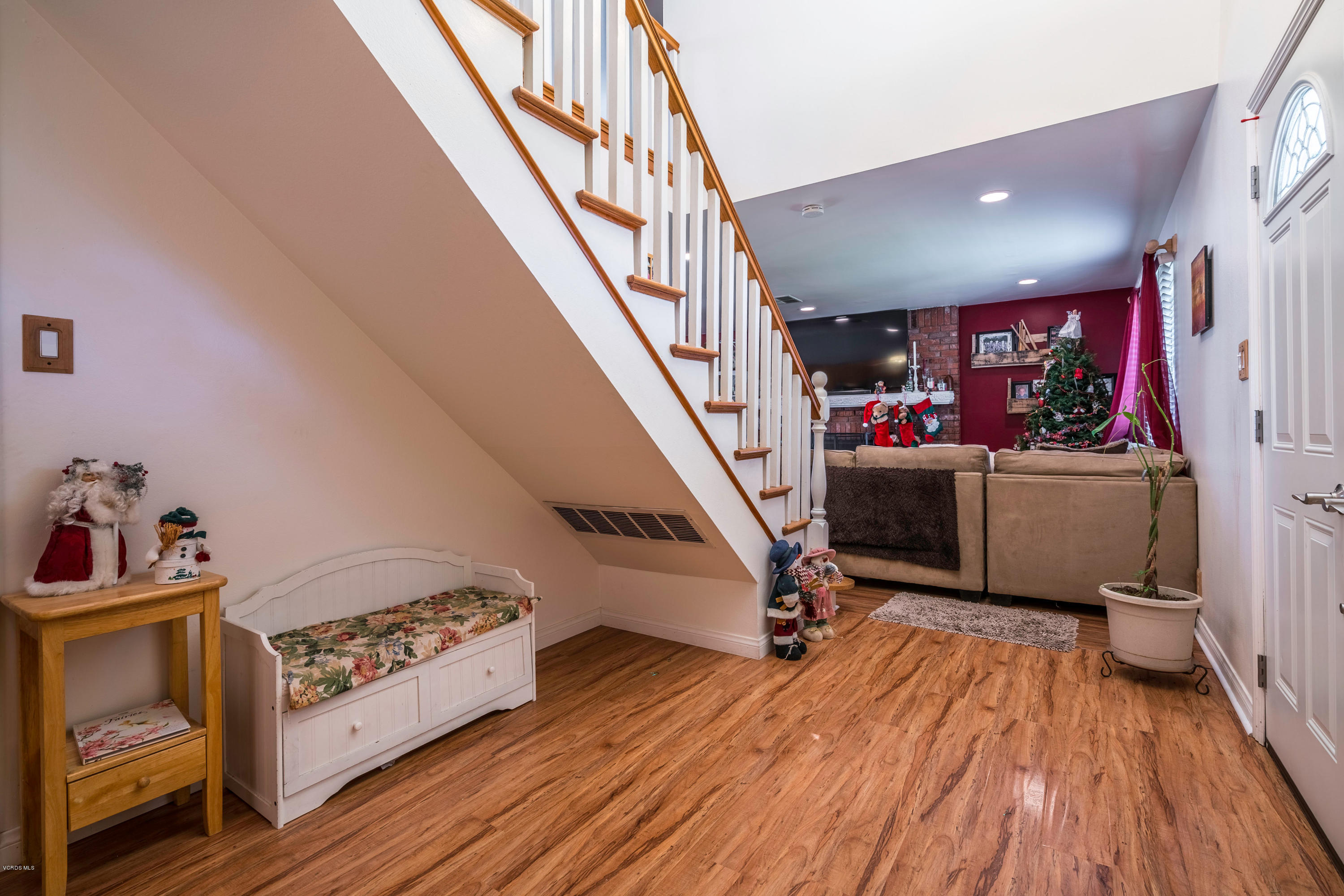 2849 Fitzgerald Road Simi Valley, CA 93065 - Photo 4 of 25 a view of a livingroom with wooden floor and furniture
