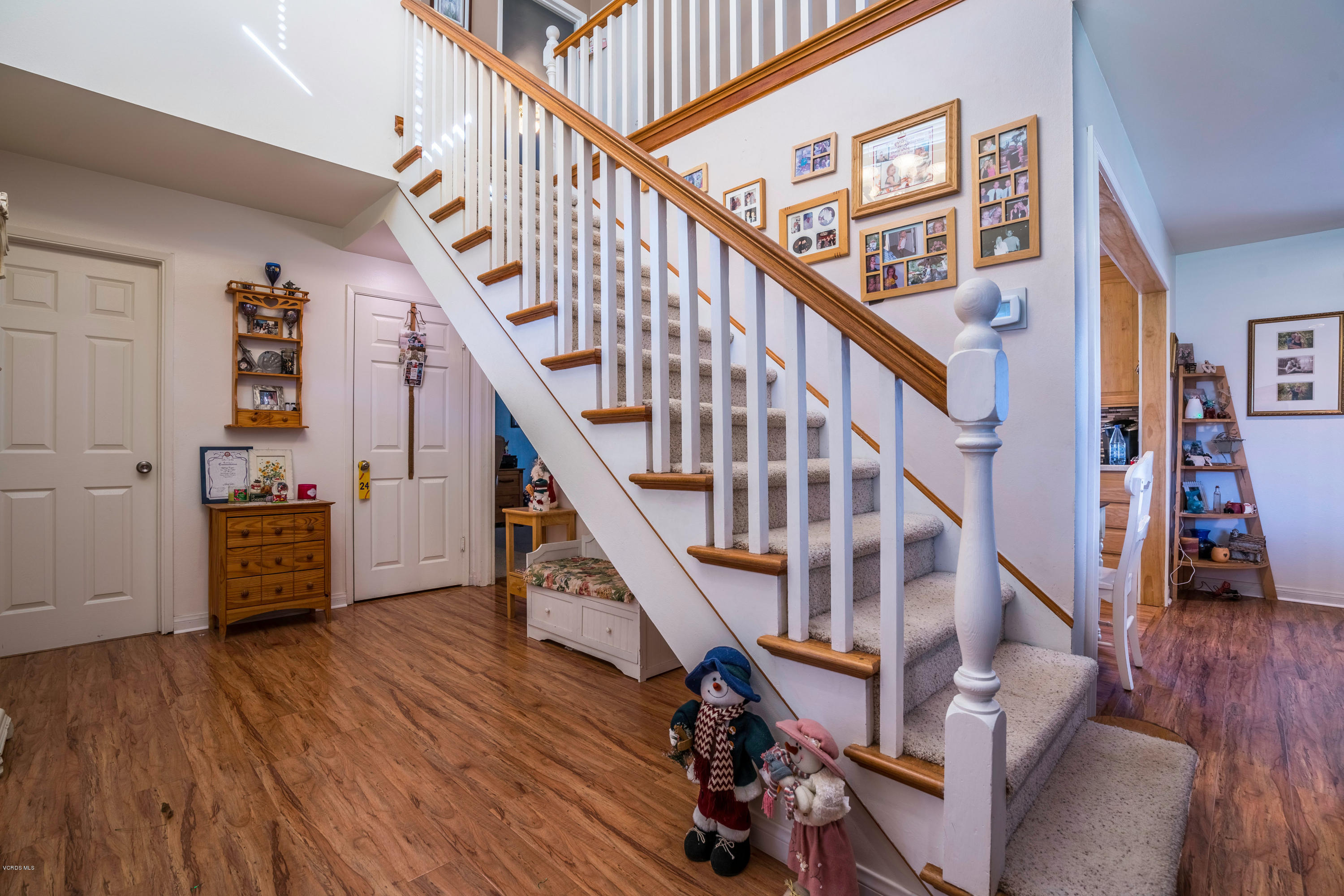 2849 Fitzgerald Road Simi Valley, CA 93065 - Photo 5 of 25 a view of entryway with wooden floor and stairs