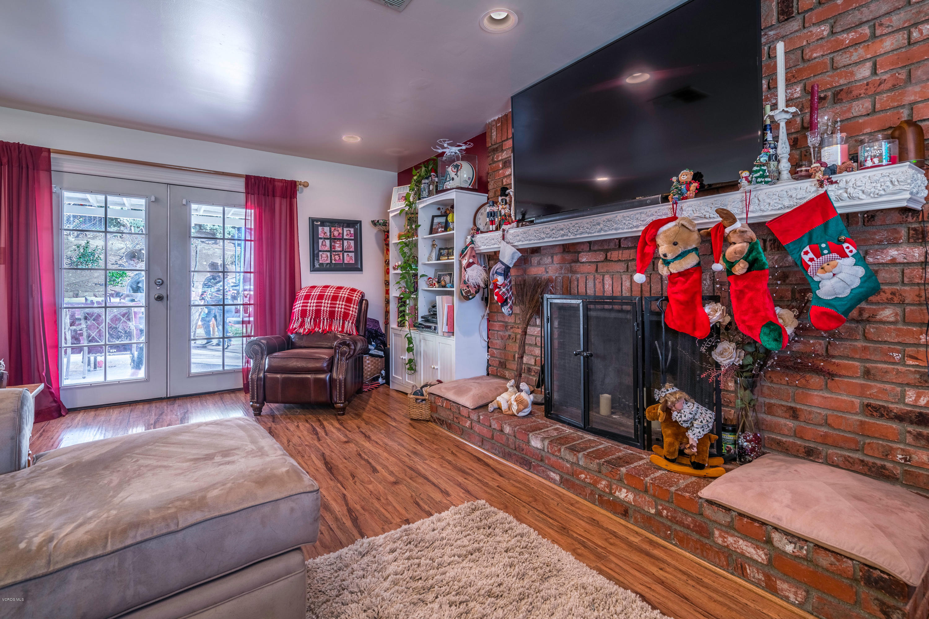 2849 Fitzgerald Road Simi Valley, CA 93065 - Photo 7 of 25 a living room with lots of furniture and a flat screen tv